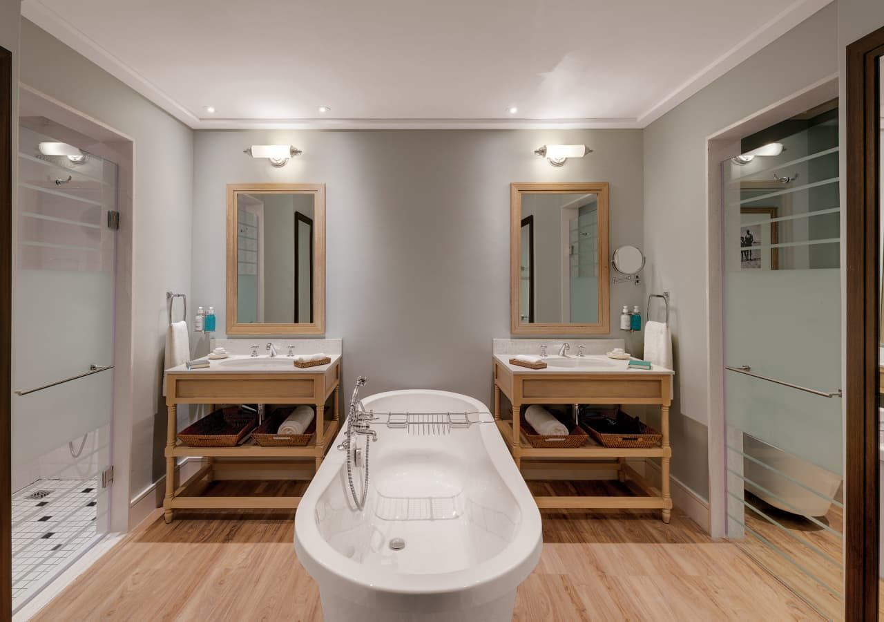 Strand hotel swakopmund guest bathroom with a bathtub 1280