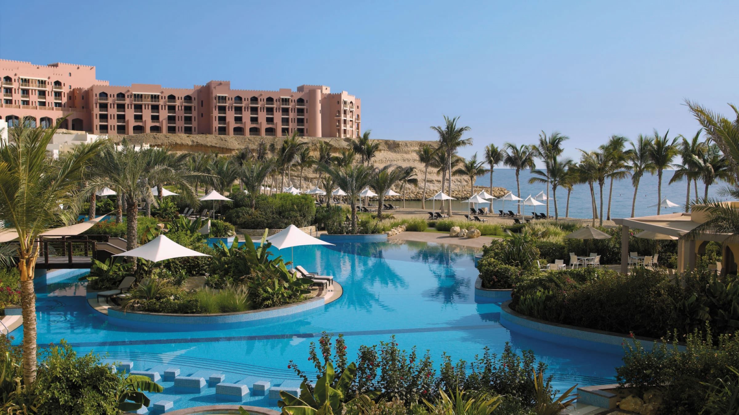 Al bandar at shangri la barr al jissah resort and spa swimming pool aerial view 2400