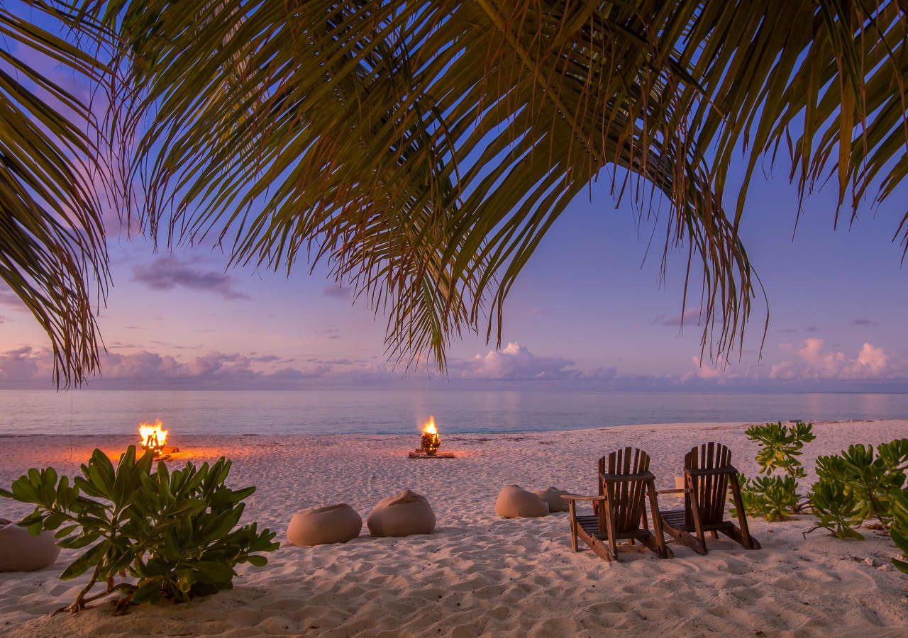 Denis private island sunset bonfire on the beach 1280