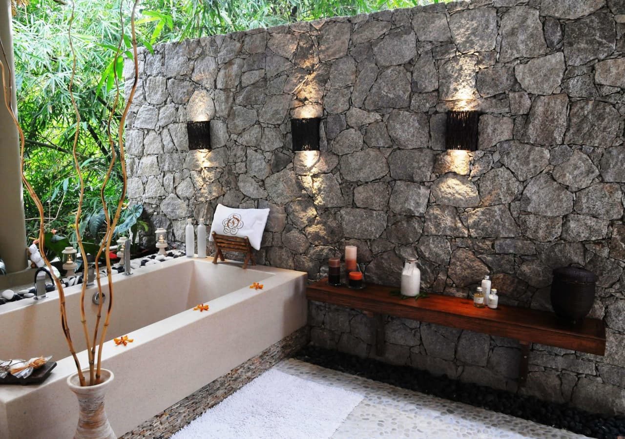 Le domaine de lorangeraie private outdoor bathroom 1280