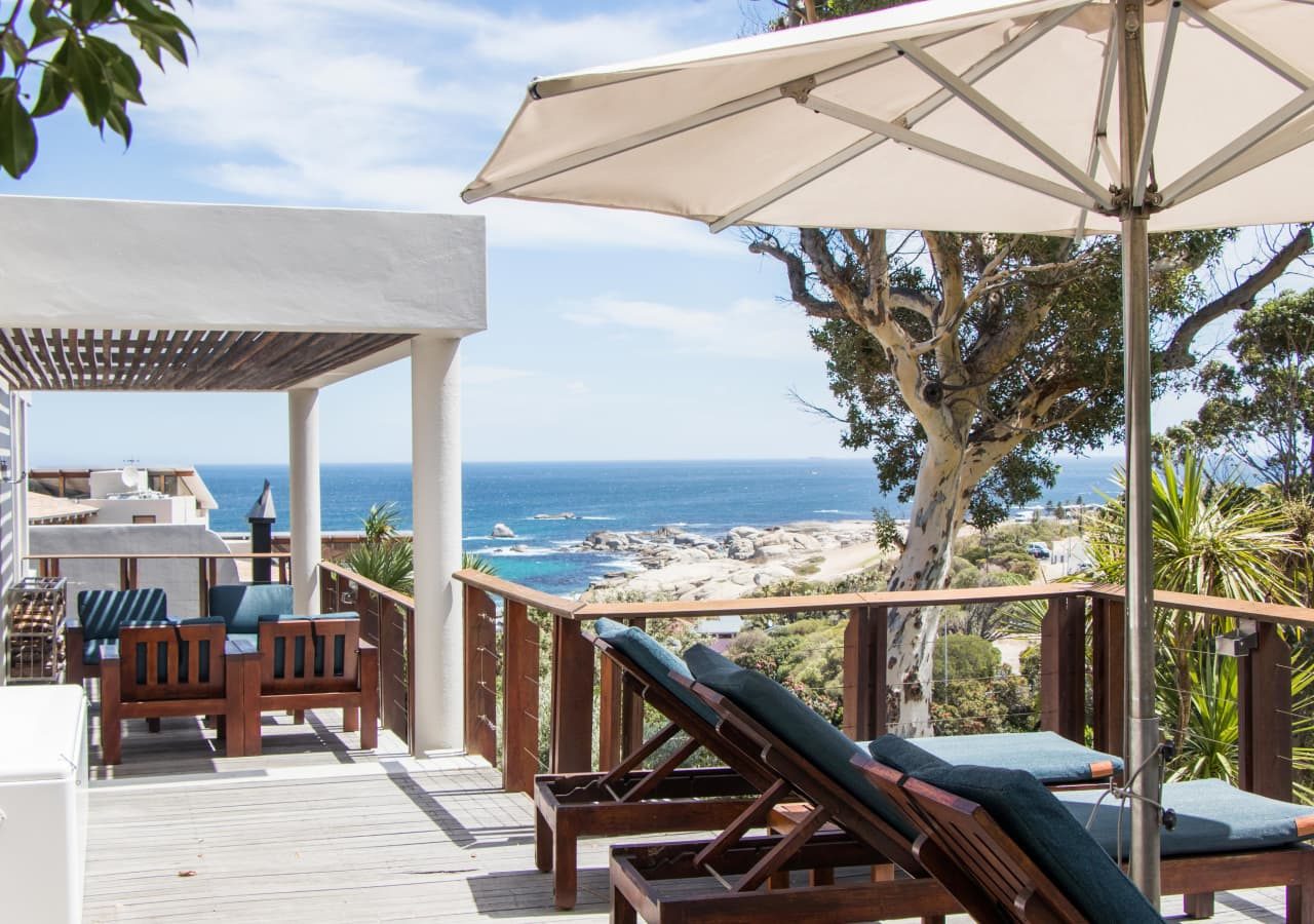 Camps bay retreat lounge balcony with a view of the sea 1280