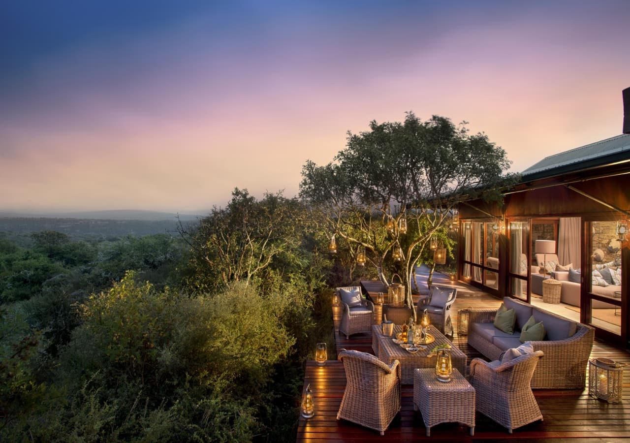 Kwandwe ecca lodge outdoor lounge at sunset 1280