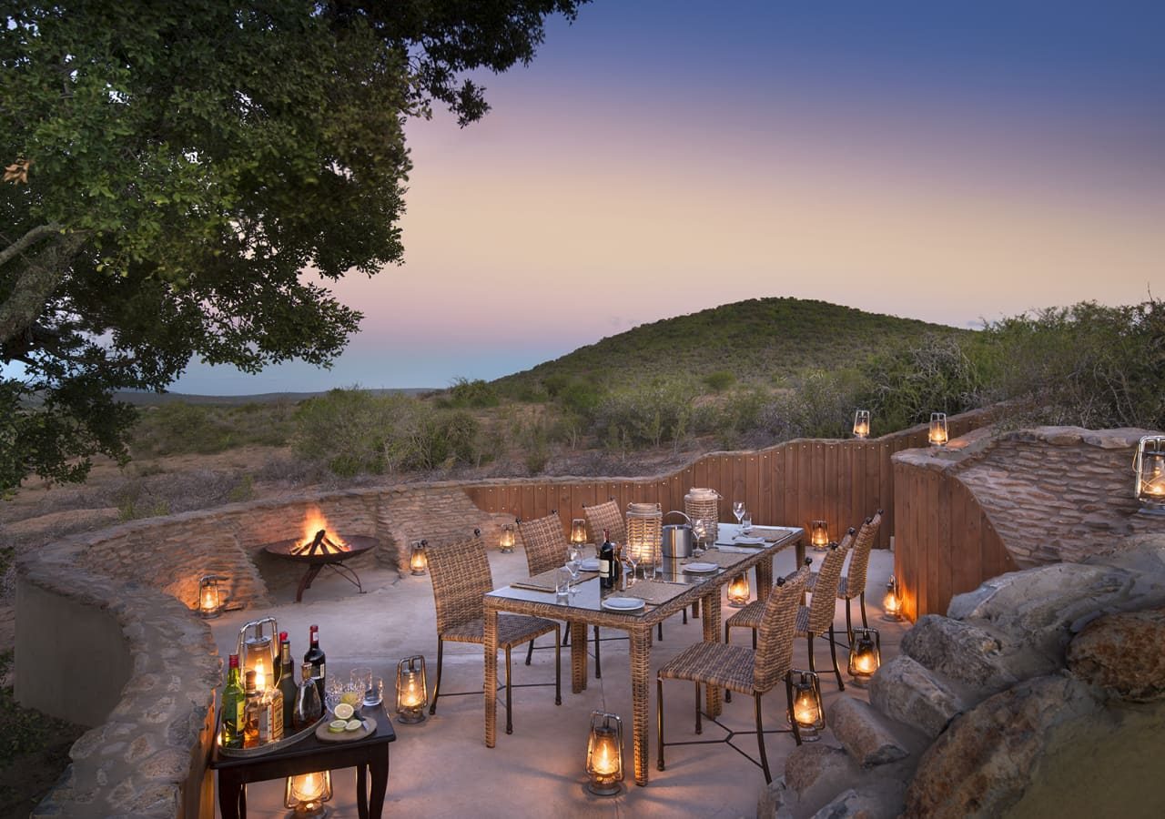 Kwandwe uplands homestead sunset dining on the terrace 1280