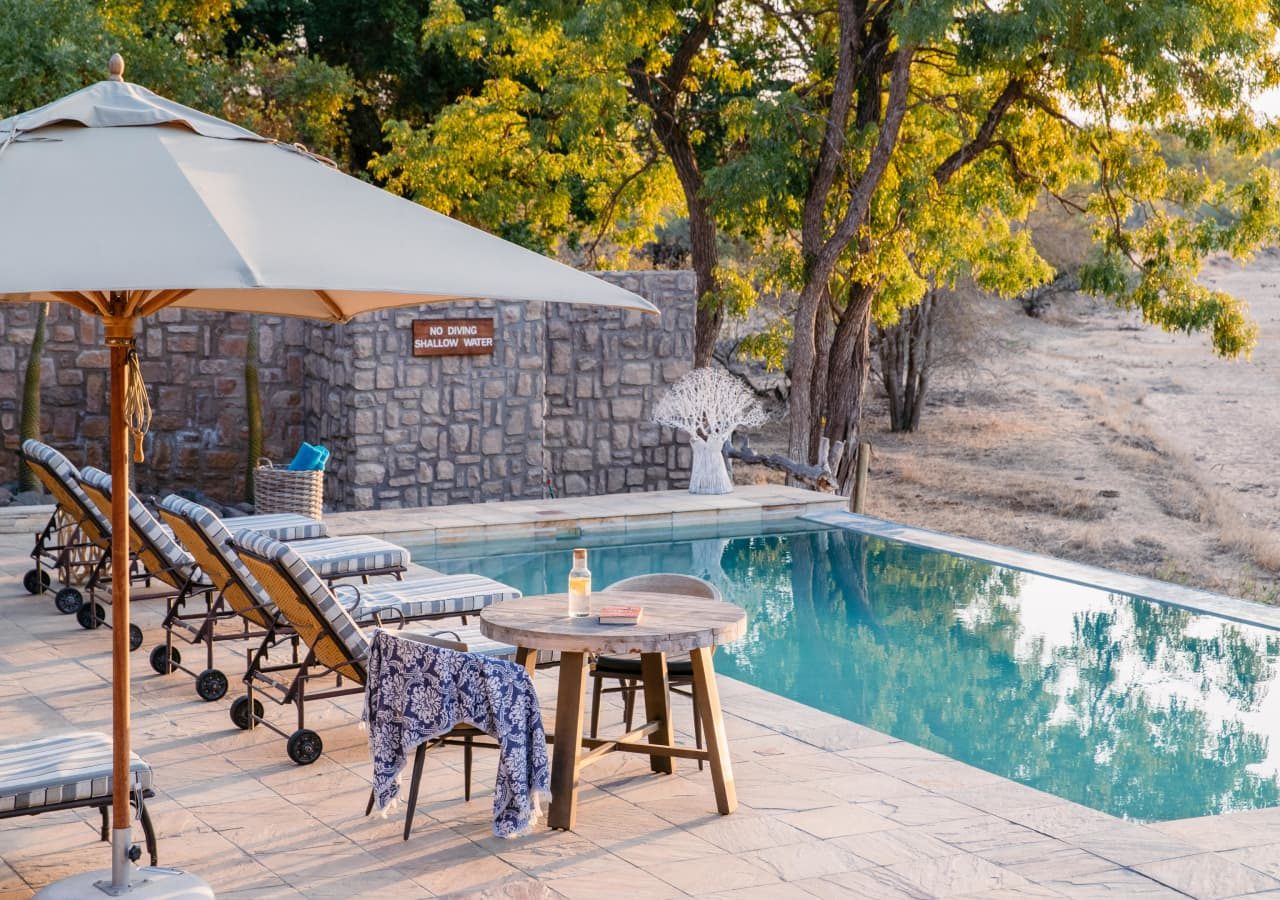 Shumbalala game lodge swimming pool and deck 1280