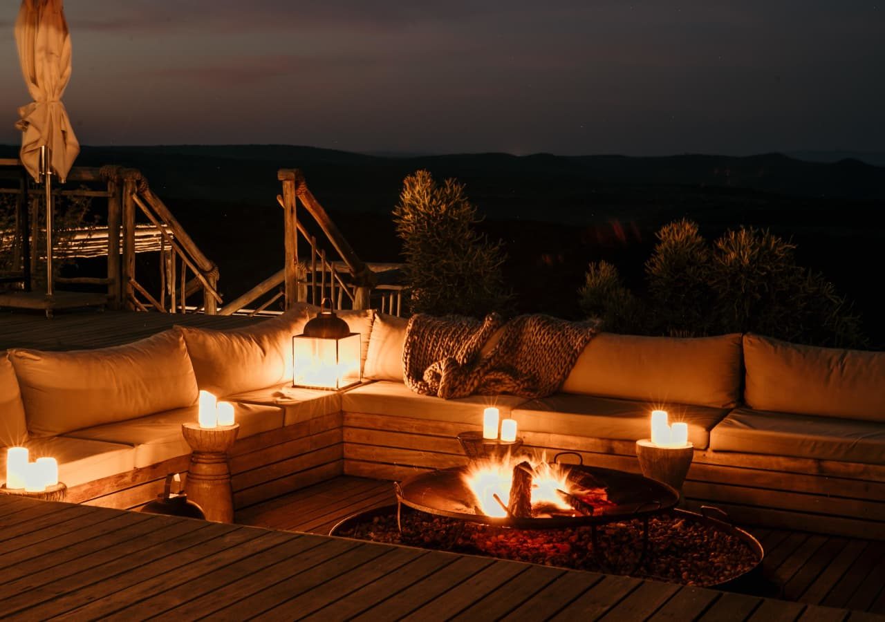 Nambiti hills private game lodge fire pit area at night 1280