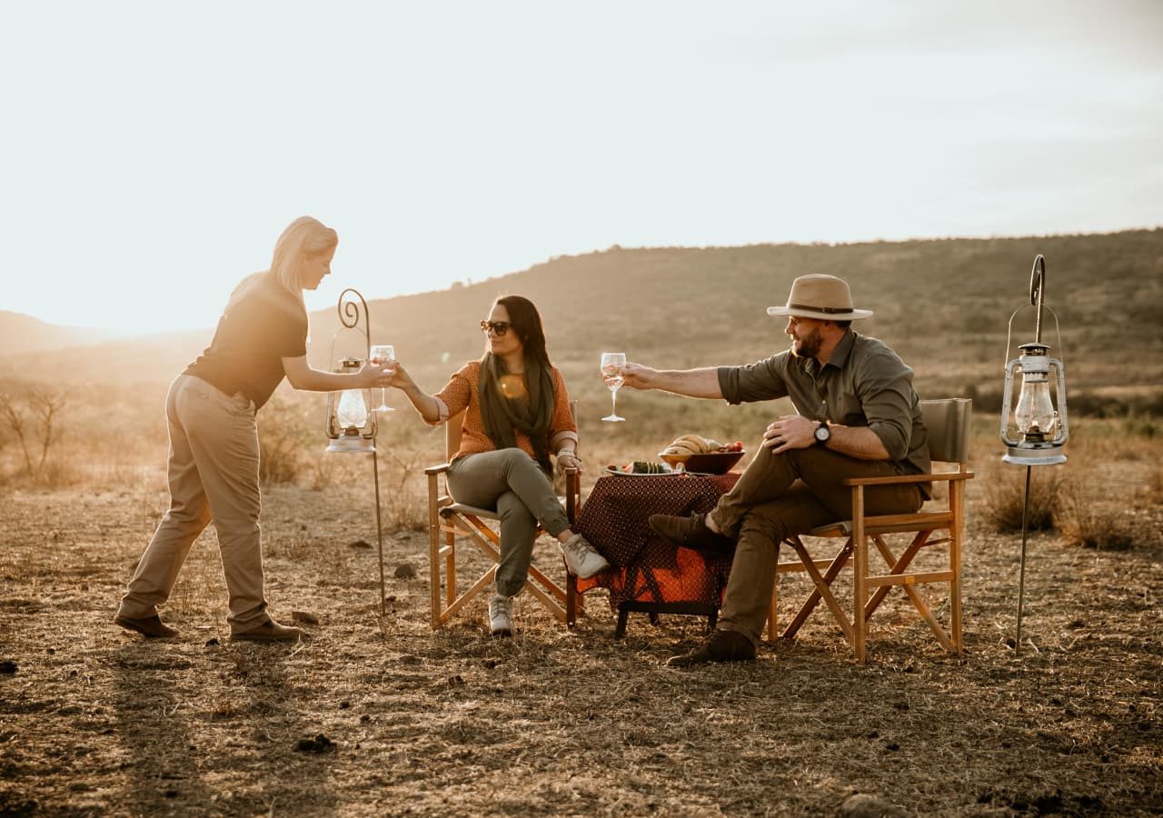 Nambiti hills private game lodge sundowners after a safari game drive 1280