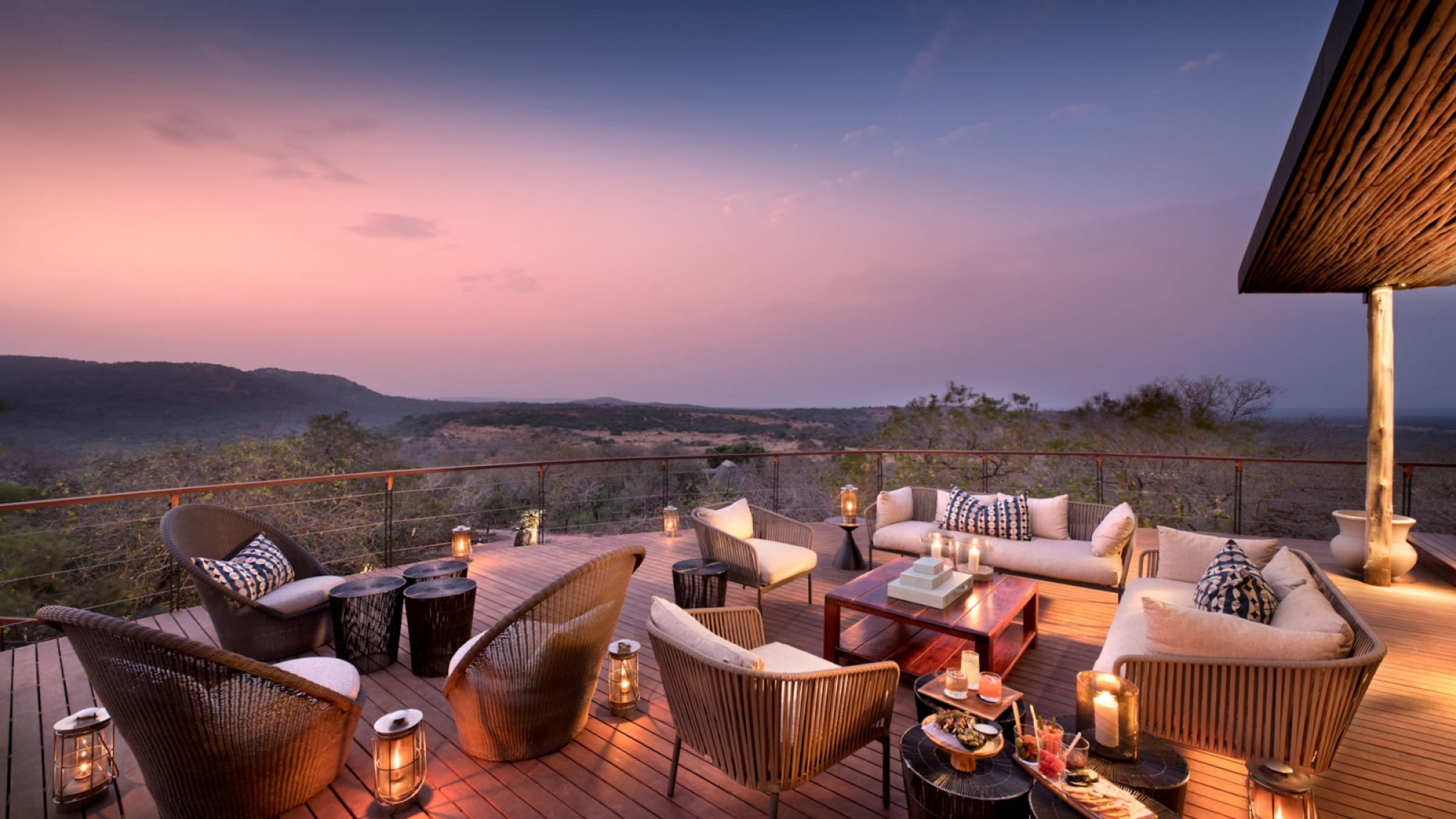 Phinda mountain lodge lodge deck with sunset views 2400