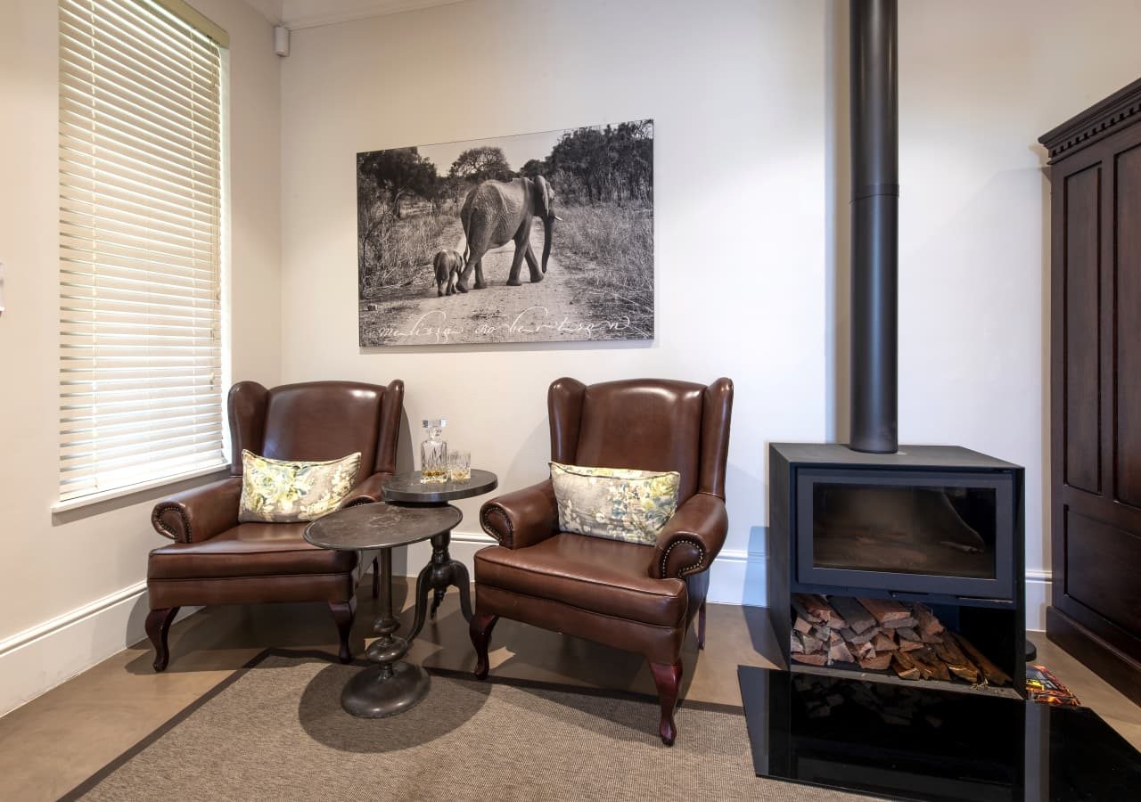 Avondrood guest house lounge area with a woodburner 1280