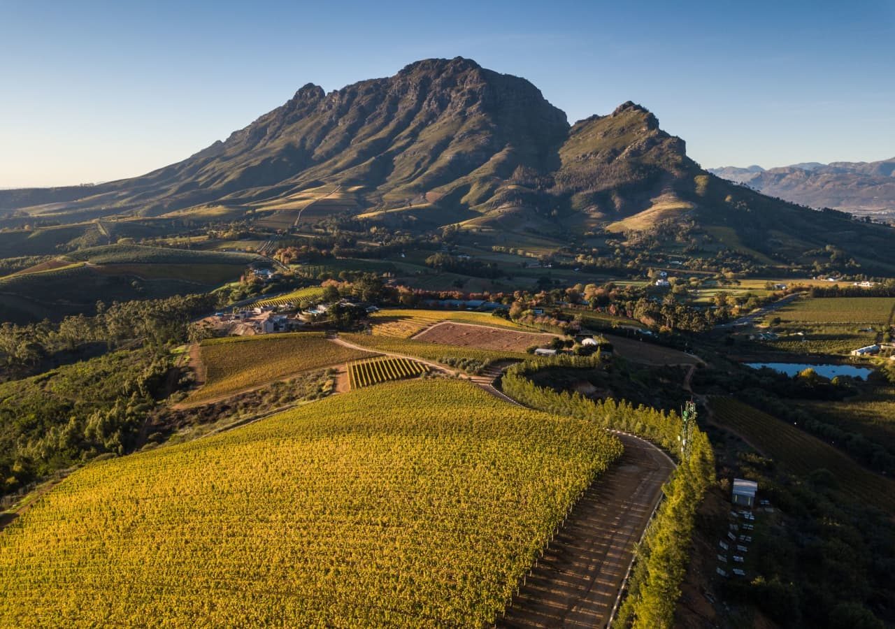 Delaire graff estate aerial view of the estate and vineyards 1280