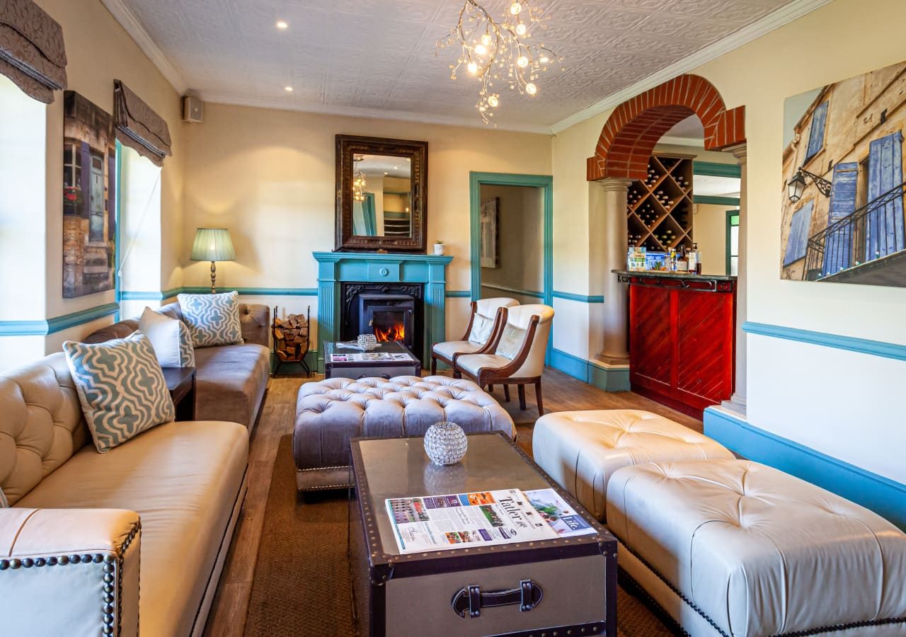 Franschhoek country house and villas lounge and bar area 1280