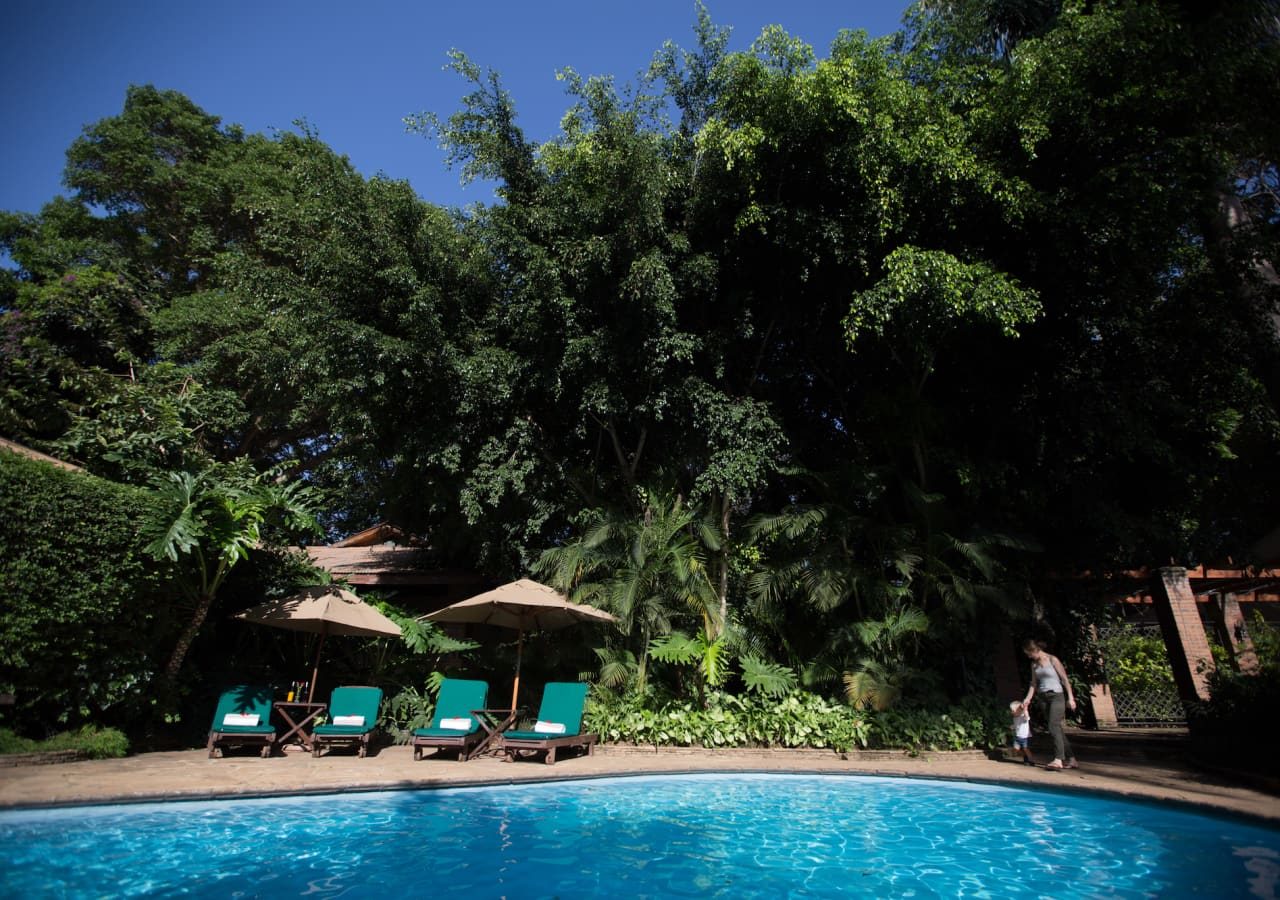 Arusha coffee lodge pool and sun loungers 1280