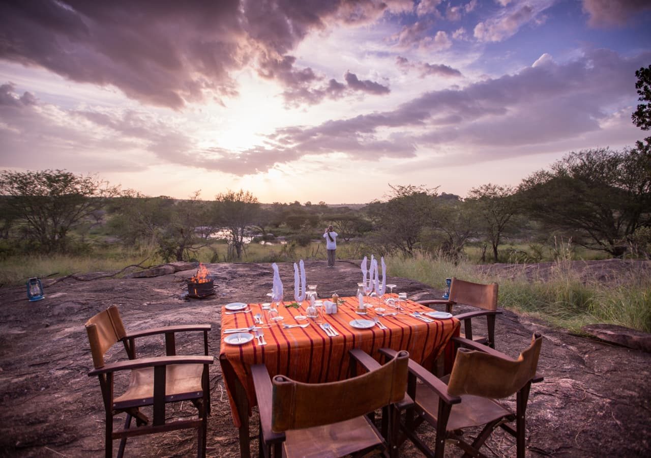 Elewana serengeti migration camp dinner views with a firepit 1280