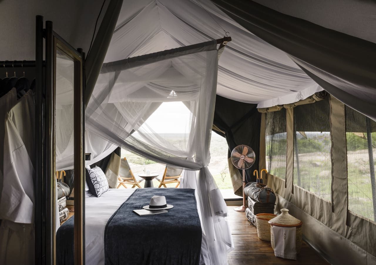 Sanctuary kichakani serengeti camp tent bedroom interior 1280