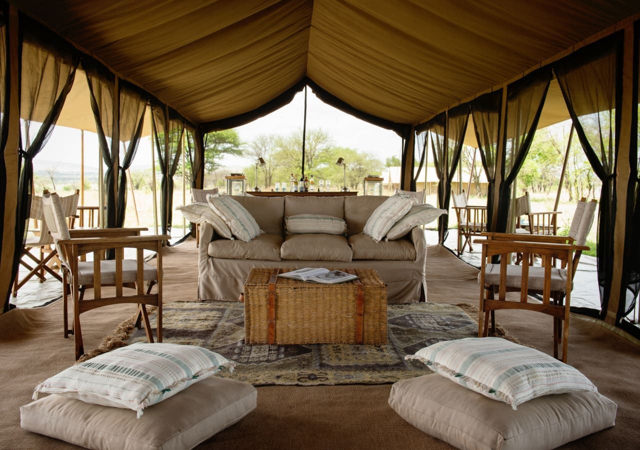 Serengeti safari camp lounge area interior 1280