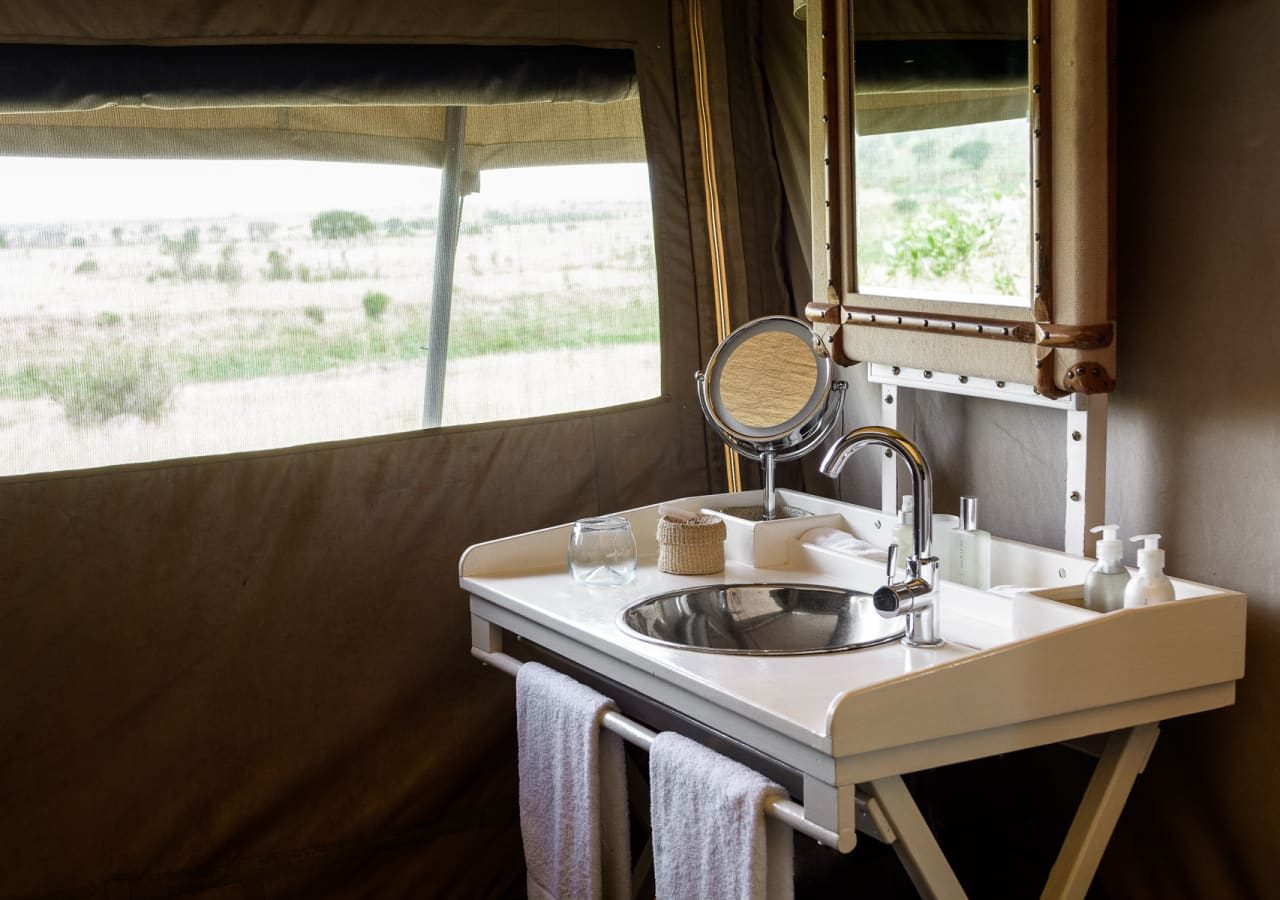 Singita mara river tented camp tented bathroom in guest suite 1280