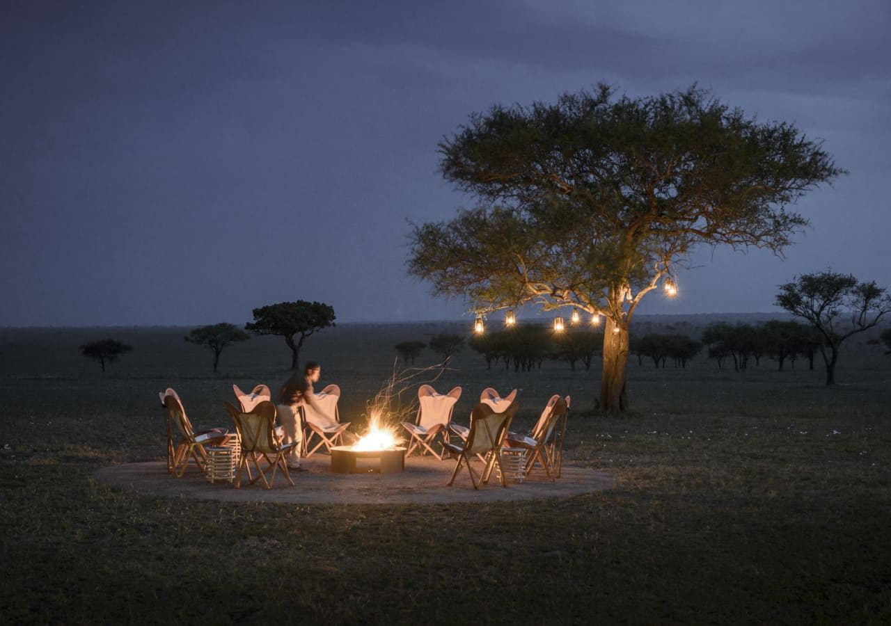 Singita sabora tented camp evening by the firepit 1280