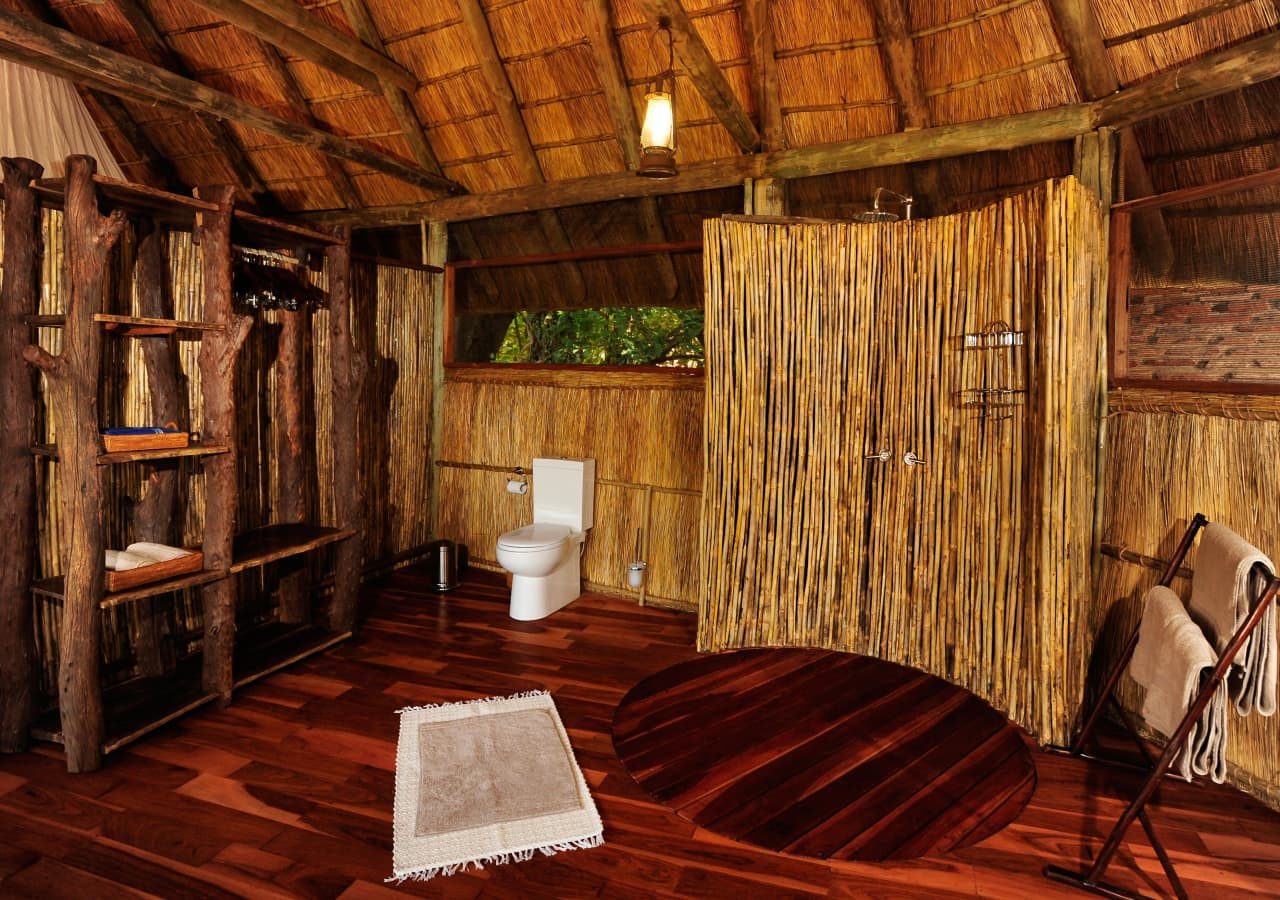 Bilimungwe bushcamp tented bathroom 1280