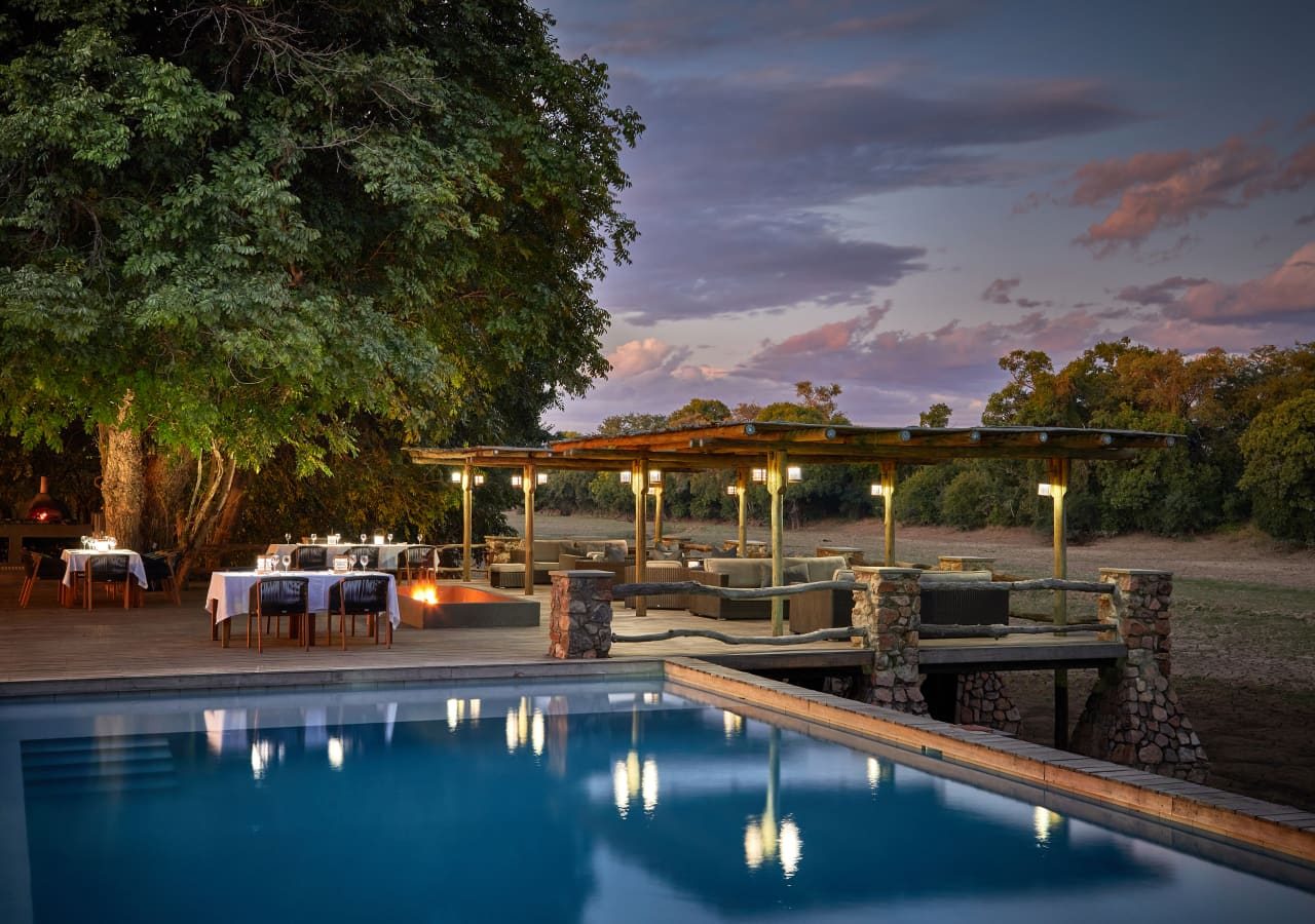 Mfuwe lodge swimming pool and outdoor dining area 1280