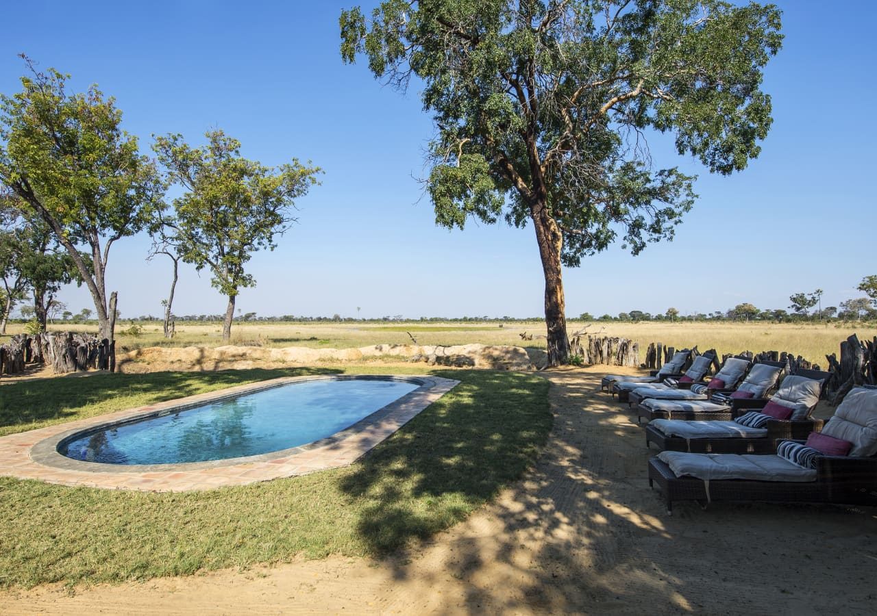 Davisons camp pool area with sun loungers 1280