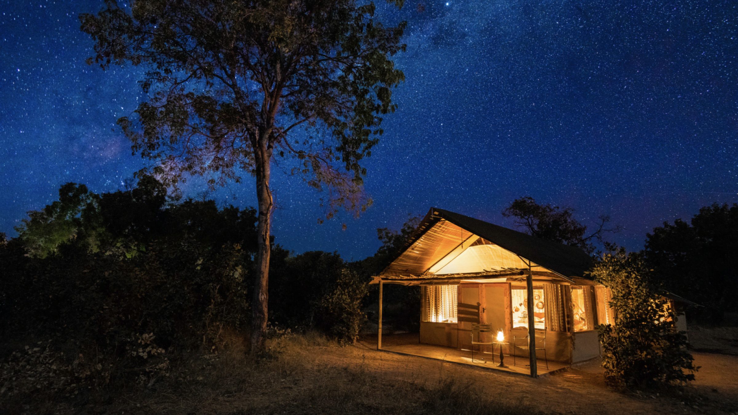 Little makalolo camp tent exterior at night 2400