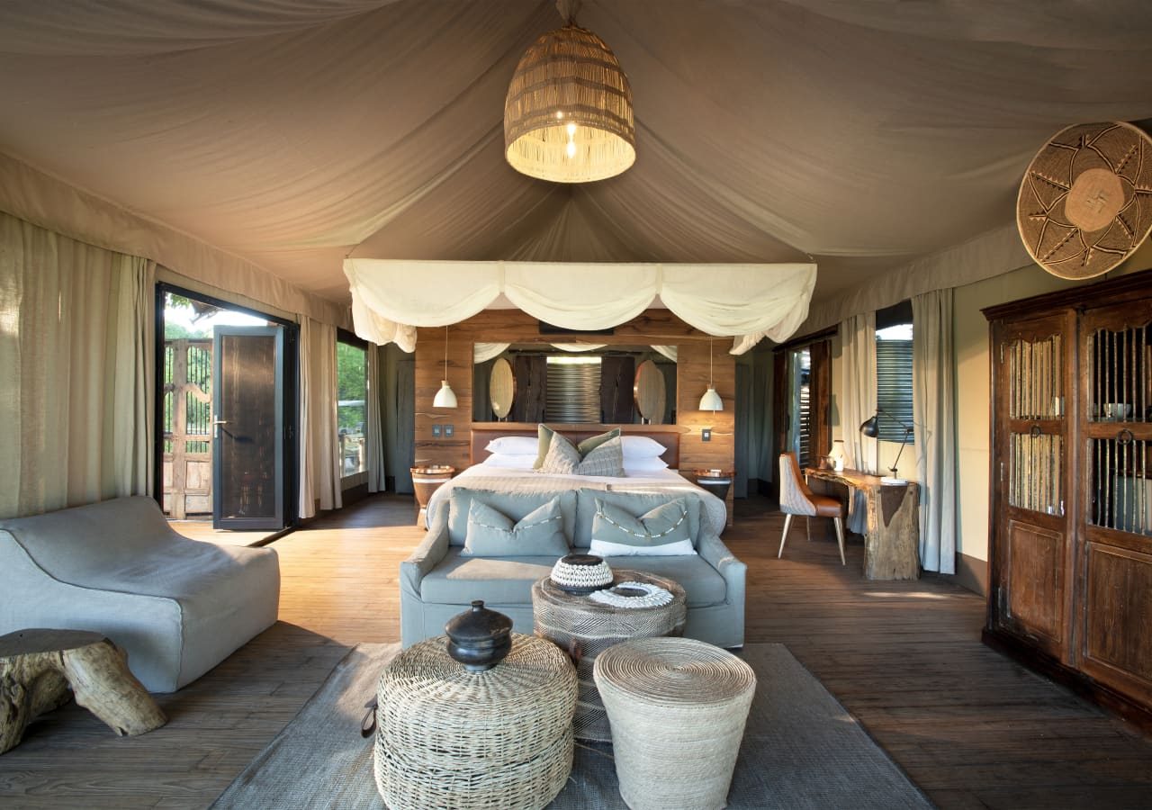 Nyamatusi camp tented suite bedroom interior 1280