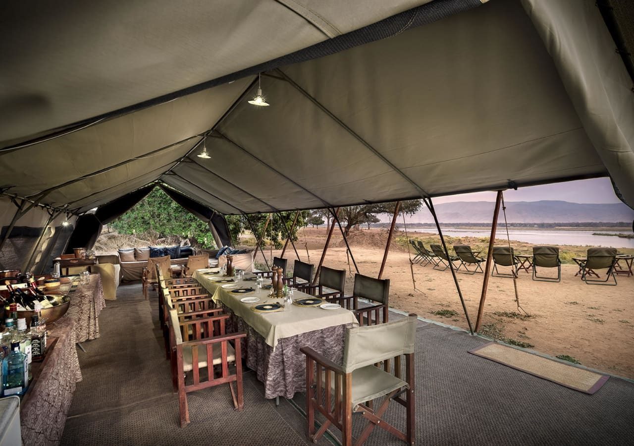 Zambezi expeditions safari camp dining tent interior 1280