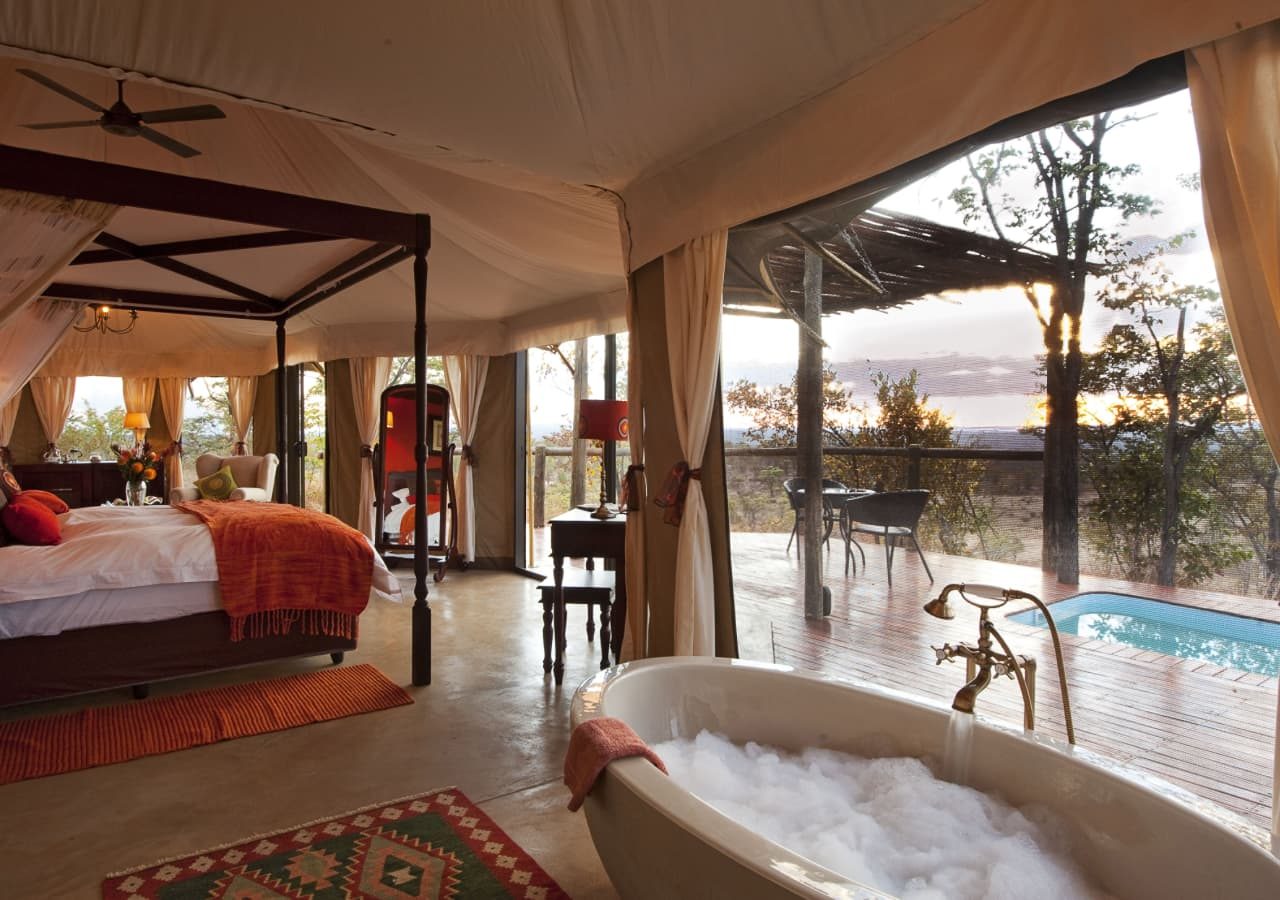 The elephant camp tented suite with a private pool and deck 1280