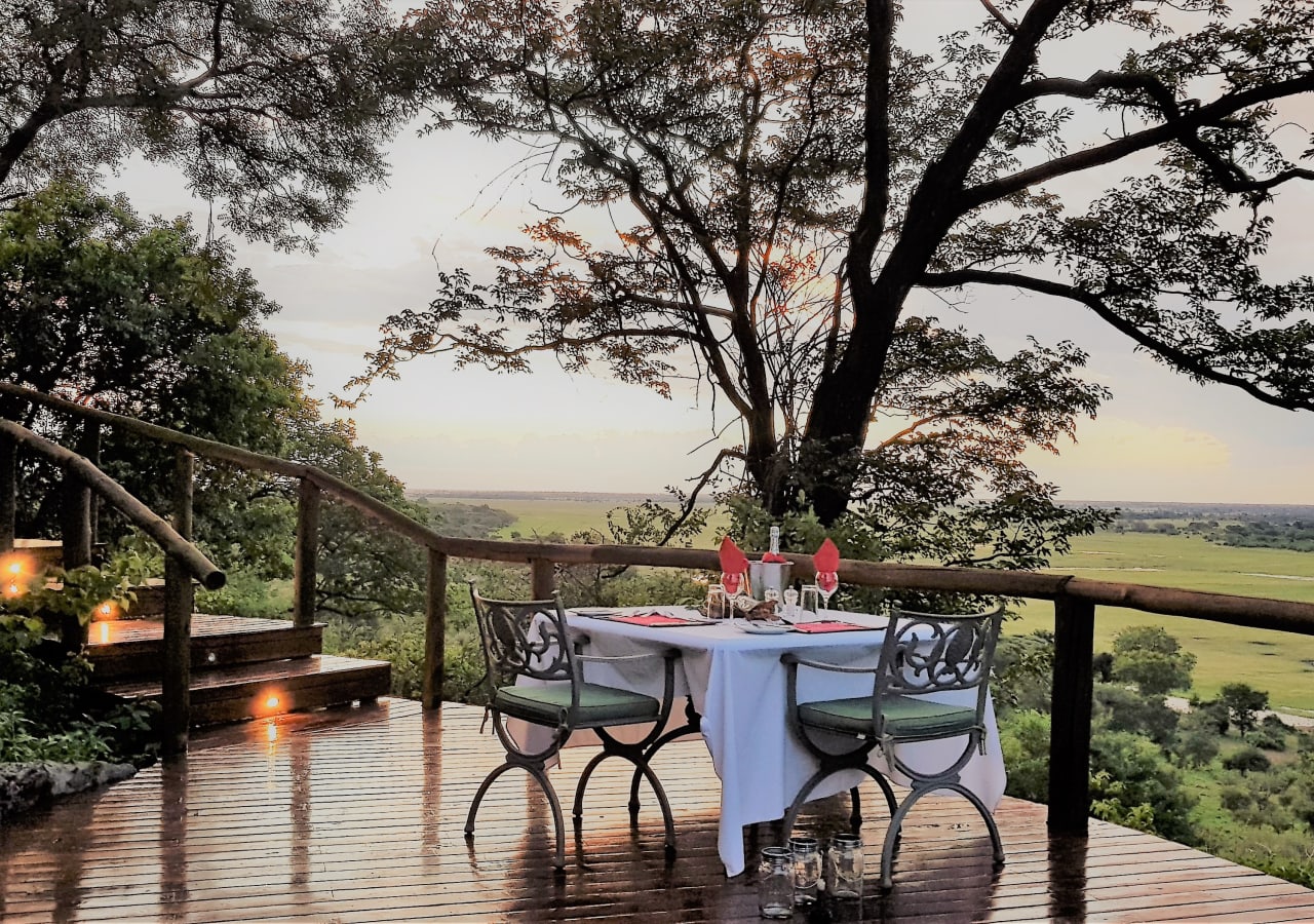private dinner table on a safari lodge deck